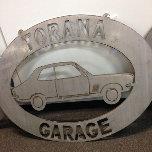 Torana Oval metal car sign