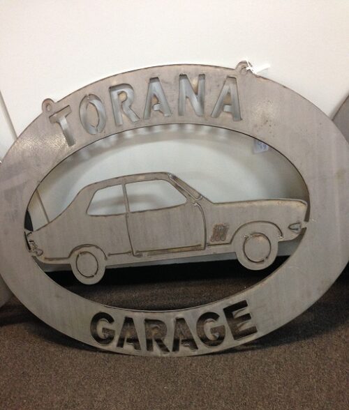 Torana Oval metal car sign