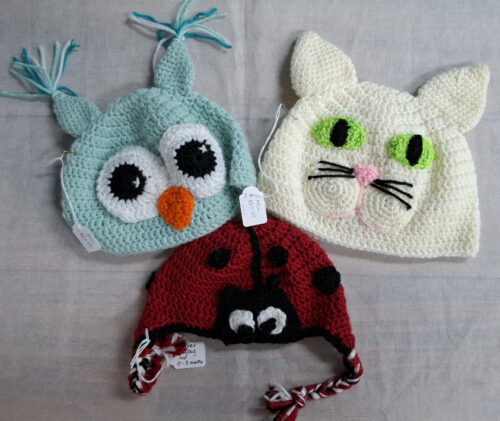 3 baby beanie hats - an owl, cat and ladybird