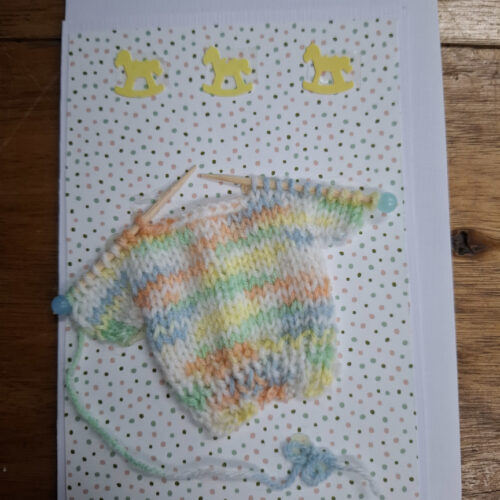 knitted jumper on card