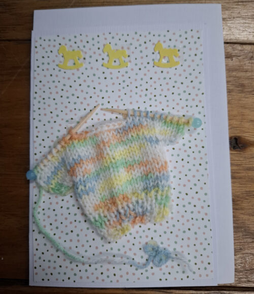 knitted jumper on card