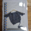 knitted jumper on card