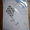 crafted kite on card